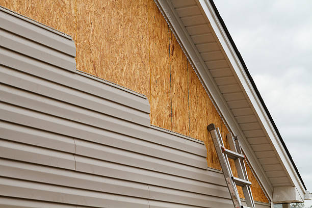 Professional Siding Installation technician working in West Hempstead, NY
